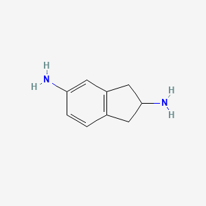 molecular formula C9H12N2 B1609309 Indan-2,5-diamine CAS No. 784106-57-6