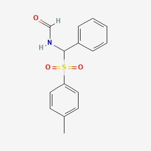 molecular formula C15H15NO3S B1610311 N-[Phenyl-(toluene-4-sulfonyl)methyl]formamide CAS No. 37643-54-2