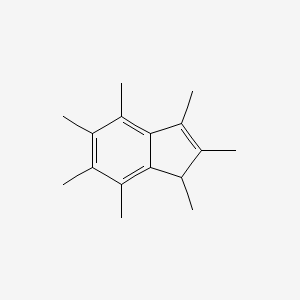 molecular formula C16H22 B1610493 1,2,3,4,5,6,7-Heptamethyl-1H-indene CAS No. 86901-30-6