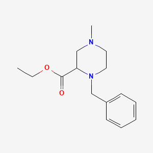 B1611487 Ethyl 1-benzyl-4-methylpiperazine-2-carboxylate CAS No. 63285-59-6