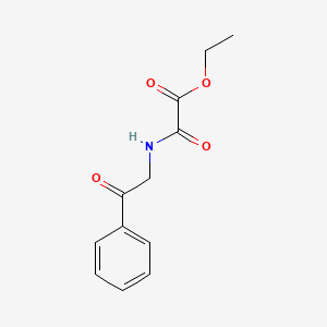 molecular formula C12H13NO4 B1611543 Ethyl 2-oxo-2-((2-oxo-2-phenylethyl)amino)acetate CAS No. 84978-66-5