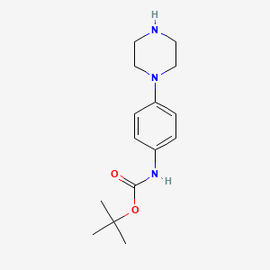 molecular formula C15H23N3O2 B1612607 tert-butyl N-[4-(piperazin-1-yl)phenyl]carbamate CAS No. 273727-52-9
