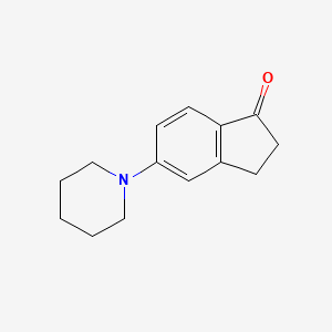 molecular formula C14H17NO B1612954 5-(Piperidin-1-yl)-2,3-dihydro-1H-inden-1-one CAS No. 808756-85-6