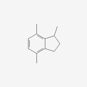 molecular formula C12H16 B1616843 1,4,7-Trimethylindan CAS No. 54340-87-3