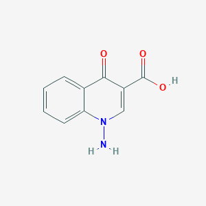 molecular formula C10H8N2O3 B161795 1-Amino-4-oxoquinoline-3-carboxylic acid CAS No. 135261-77-7
