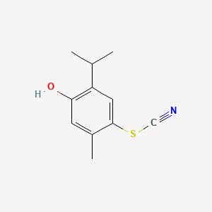 molecular formula C11H13NOS B1619637 Thiocyanic acid, 5-hydroxycarvacryl ester CAS No. 6074-31-3