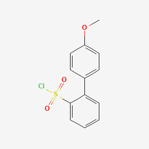 molecular formula C13H11ClO3S B1622101 [2-(4-Methoxyphenyl)phenyl]sulfonyl chloride CAS No. 173253-50-4