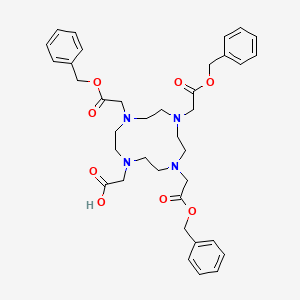 {4,7,10-Tris[2-(benzyloxy)-2-oxoethyl]-1,4,7,10-tetraazacyclododecan-1-yl}acetic acid