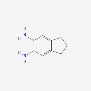 molecular formula C9H12N2 B1625327 5,6-Diaminoindane CAS No. 52957-65-0