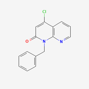molecular formula C15H11ClN2O B1625565 1-Benzyl-4-chloro-1,8-naphthyridin-2(1H)-one CAS No. 583031-57-6