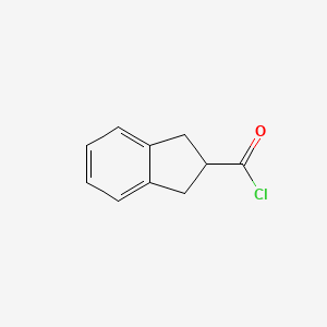 molecular formula C10H9ClO B1629484 2,3-dihydro-1H-indene-2-carbonyl chloride CAS No. 54672-55-8