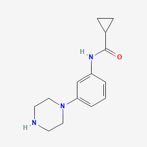 molecular formula C14H19N3O B1639870 N-(3-piperazin-1-ylphenyl)cyclopropanecarboxamide 