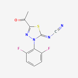 [5-Acetyl-3-(2,6-difluorophenyl)-1,3,4-thiadiazol-2-ylidene]cyanamide