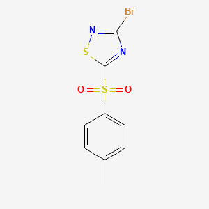 3-Bromo-5-(4-methylphenylsulfonyl)-1,2,4-thiadiazole