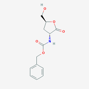 B165277 benzyl N-[(3R,5S)-5-(hydroxymethyl)-2-oxooxolan-3-yl]carbamate CAS No. 132970-47-9