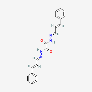 B1656951 N,N'-bis[(E)-[(E)-3-phenylprop-2-enylidene]amino]oxamide CAS No. 5485-18-7