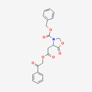 molecular formula C21H19NO7 B1656952 Benzyl 5-oxo-4-(2-oxo-2-phenacyloxyethyl)-1,3-oxazolidine-3-carboxylate CAS No. 5486-26-0