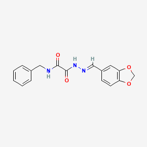 B1657191 N'-[(E)-1,3-benzodioxol-5-ylmethylideneamino]-N-benzyloxamide CAS No. 5568-76-3