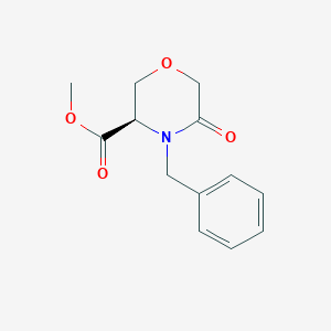 molecular formula C13H15NO4 B165741 Methyl (R)-4-Benzyl-5-oxo-3-morpholinecarboxylate CAS No. 1235639-75-4