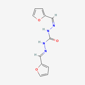 molecular formula C11H10N4O3 B1659628 1-[(Z)-furan-2-ylmethylideneamino]-3-[(E)-furan-2-ylmethylideneamino]urea CAS No. 6639-72-1