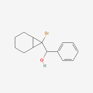 B1660057 (7-Bromobicyclo[4.1.0]hept-7-yl)phenylmethanol CAS No. 71161-54-1