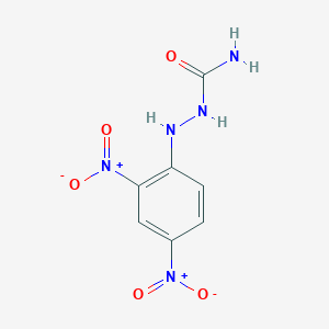 molecular formula C7H7N5O5 B1660305 (2,4-Dinitroanilino)urea CAS No. 74367-79-6