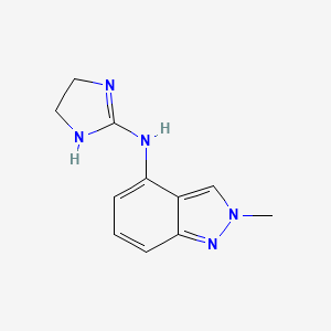 molecular formula C₁₁H₁₃N₅ B1663842 Indanidine CAS No. 85392-79-6