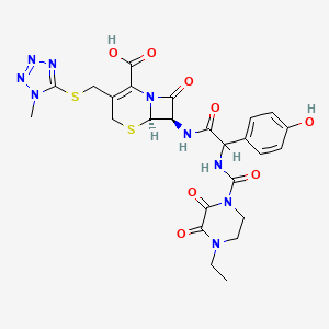 molecular formula C25H27N9O8S2 B1668861 (6R,7R)-7-[[2-[(4-ethyl-2,3-dioxo-piperazine-1-carbonyl)amino]-2-(4-hydroxyphenyl)acetyl]amino]-3-[(1-methyltetrazol-5-yl)sulfanylmethyl]-8-oxo-5-thia-1-azabicyclo[4.2.0]oct-2-ene-2-carboxylic acid CAS No. 62893-19-0