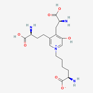 B1670262 N-(5-Amino-5-carboxypentyl)-3-hydroxy-4-(2-amino-2-carboxyethyl)-5-(3-amino-3-carboxypropyl)pyridine CAS No. 90032-33-0