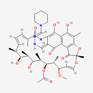 B1672309 [(7S,9E,11S,12R,13S,14R,15R,16R,17S,18S,19E,21E)-2,15,17,27,29-pentahydroxy-11-methoxy-3,7,12,14,16,18,22-heptamethyl-6,23-dioxo-26-[(Z)-[(E)-piperidin-1-ylmethylidenehydrazinylidene]methyl]-8,30-dioxa-24-azatetracyclo[23.3.1.14,7.05,28]triaconta-1(29),2,4,9,19,21,25,27-octaen-13-yl] acetate CAS No. 84475-07-0