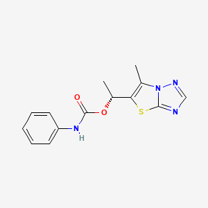 molecular formula C14H14N4O2S B1672368 [(1R)-1-(6-methyl-[1,3]thiazolo[2,3-e][1,2,4]triazol-5-yl)ethyl] N-phenylcarbamate 