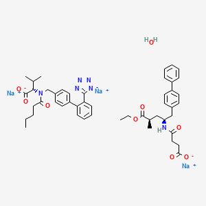 molecular formula C96H120N12Na6O21 B1674666 trisodium;4-[[(2S,4R)-5-ethoxy-4-methyl-5-oxo-1-(4-phenylphenyl)pentan-2-yl]amino]-4-oxobutanoate;(2S)-3-methyl-2-[pentanoyl-[[4-[2-(1,2,3-triaza-4-azanidacyclopenta-2,5-dien-5-yl)phenyl]phenyl]methyl]amino]butanoate;hydrate CAS No. 936623-90-4
