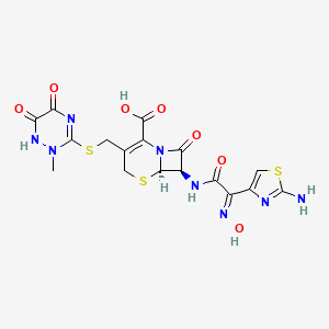 B1679442 7-(2-(2-Amino-4-thiazolyl)acetamido)-3-(((2,5-dihydro-6-hydroxy-2-methyl-5-oxo-as-triazin-3-yl)thio)methyl)-8-oxo-5-thia-1-azabicyclo(4.2.0)oct-2-ene-2-carboxylic acid CAS No. 82502-19-0