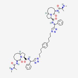molecular formula C62H84N14O6 B1681016 (3S,6S,10aS)-N-[(S)-[1-[4-[4-[4-[4-[(S)-[[(3S,6S,10aS)-6-[[(2S)-2-(methylamino)propanoyl]amino]-5-oxo-2,3,6,7,8,9,10,10a-octahydro-1H-pyrrolo[1,2-a]azocine-3-carbonyl]amino]-phenylmethyl]triazol-1-yl]butyl]phenyl]butyl]triazol-4-yl]-phenylmethyl]-6-[[(2S)-2-(methylamino)propanoyl]amino]-5-oxo-2,3,6,7,8,9,10,10a-octahydro-1H-pyrrolo[1,2-a]azocine-3-carboxamide CAS No. 957135-43-2