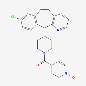 B1681542 [4-(13-Chloro-4-azatricyclo[9.4.0.03,8]pentadeca-1(11),3(8),4,6,12,14-hexaen-2-ylidene)piperidin-1-yl]-(1-oxido-2H-pyridin-4-yl)methanone CAS No. 133330-43-5