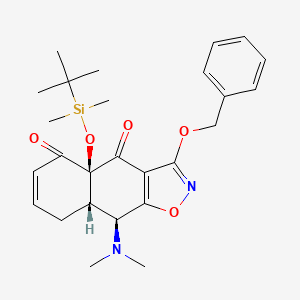 B1682438 (4aS,8aS,9S)-3-(benzyloxy)-4a-((tert-butyldimethylsilyl)oxy)-9-(dimethylamino)-8a,9-dihydronaphtho[2,3-d]isoxazole-4,5(4aH,8H)-dione CAS No. 852821-06-8