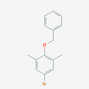 molecular formula C15H15BrO B168555 2-(Benzyloxy)-5-bromo-1,3-dimethylbenzene CAS No. 168196-87-0