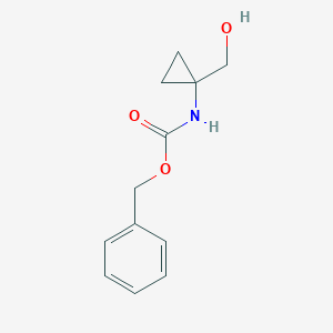 molecular formula C12H15NO3 B169170 Benzyl (1-(hydroxymethyl)cyclopropyl)carbamate CAS No. 103500-22-7