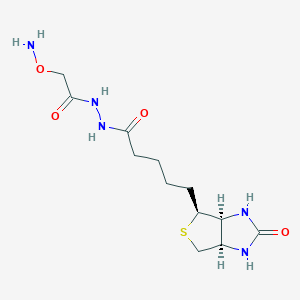 molecular formula C12H21N5O4S B169211 O-(Biotinylcarbazoylmethyl)hydroxylamine CAS No. 139585-03-8