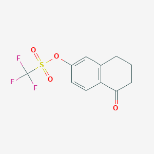 molecular formula C11H9F3O4S B170979 5-Oxo-5,6,7,8-tetrahydronaphthalen-2-yl trifluoromethanesulfonate CAS No. 144464-64-2