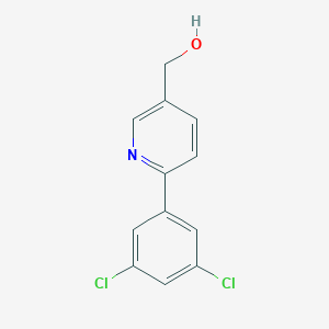 molecular formula C12H9Cl2NO B172540 5-(2-chloro-4-fluorophenyl)-2H-tetrazole CAS No. 1261268-87-4