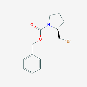 molecular formula C13H16BrNO2 B172545 (S)-2-Bromomethyl-pyrrolidine-1-carboxylic acid benzyl ester CAS No. 128510-24-7
