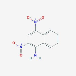 molecular formula C10H7N3O4 B172571 1-Naphthalenamine, 2,4-dinitro- CAS No. 13029-24-8