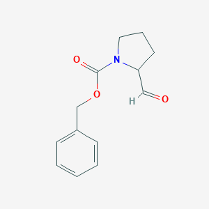 molecular formula C13H15NO3 B172982 Benzyl 2-formylpyrrolidine-1-carboxylate CAS No. 105706-84-1