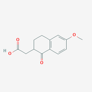 molecular formula C13H14O4 B176395 6-Methoxy-1-oxo-1,2,3,4-tetrahydronaphthalen-2-YL)acetic acid CAS No. 17529-16-7