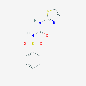 molecular formula C11H11N3O3S2 B181375 1-(4-Methylphenyl)sulfonyl-3-(1,3-thiazol-2-yl)urea CAS No. 24535-63-5