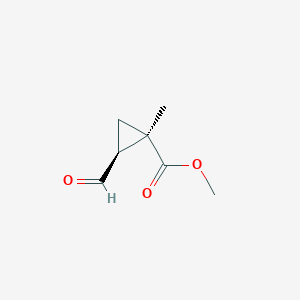 molecular formula C7H10O3 B018675 Cyclopropanecarboxylic acid, 2-formyl-1-methyl-, methyl ester, cis-(9CI) CAS No. 107804-96-6