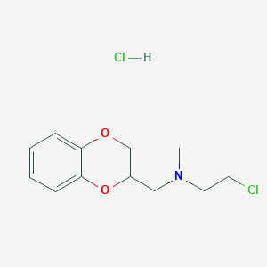 molecular formula C12H17Cl2NO2 B019898 2-chloro-N-(2,3-dihydro-1,4-benzodioxin-3-ylmethyl)-N-methylethanamine;hydrochloride CAS No. 100447-57-2