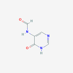 molecular formula C5H5N3O2 B022467 N-(4-Oxo-1,4-dihydropyrimidin-5-yl)formamide CAS No. 106289-05-8