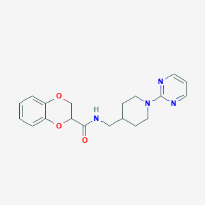 molecular formula C19H22N4O3 B2359319 N-[(1-Pyrimidin-2-ylpiperidin-4-yl)methyl]-2,3-dihydro-1,4-benzodioxine-3-carboxamide CAS No. 1235637-68-9